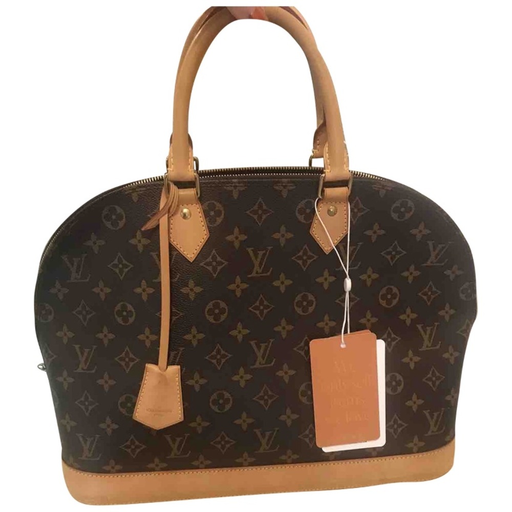 Authentic Alma GM with dust bag